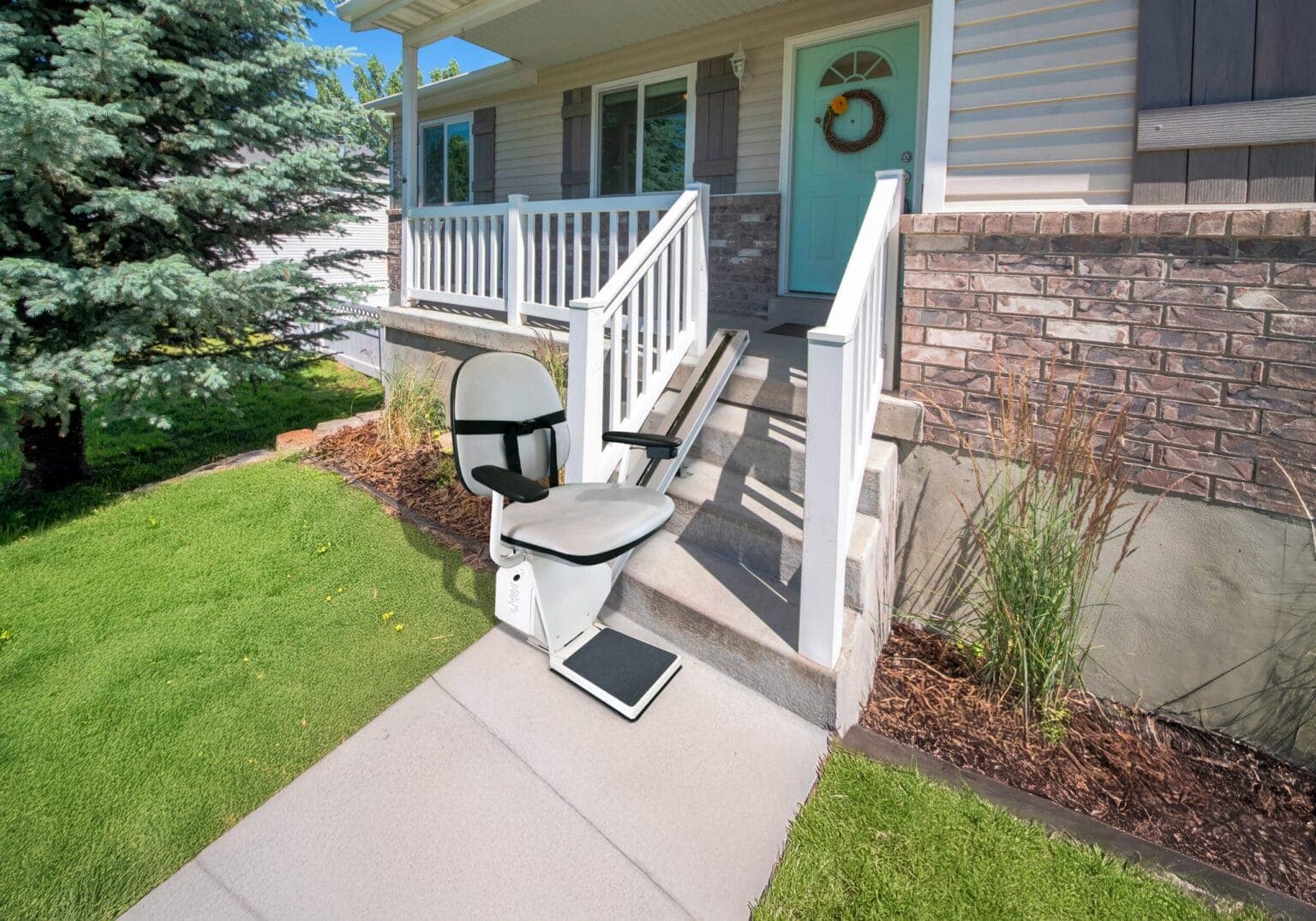 Outdoor stair chair on the front steps of a home